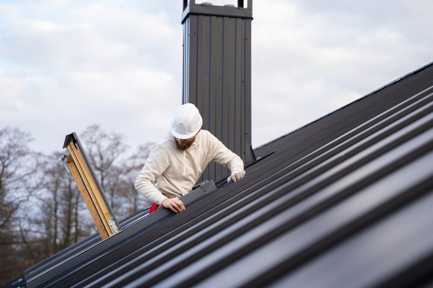 A person working on the roof 